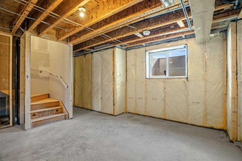 1604-525 River Heights Drive, Cochrane, AB - Indoor Photo Showing Basement