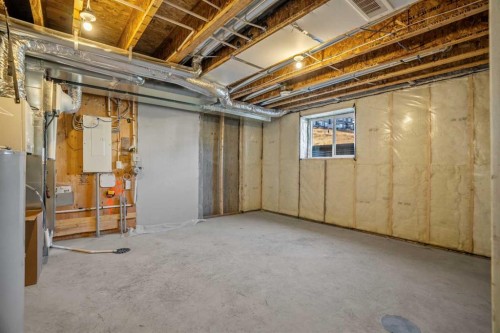 1604-525 River Heights Drive, Cochrane, AB - Indoor Photo Showing Basement