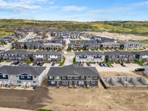 1604-525 River Heights Drive, Cochrane, AB - Outdoor With View