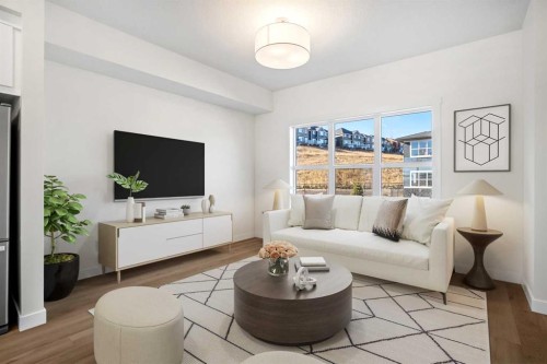 1604-525 River Heights Drive, Cochrane, AB - Indoor Photo Showing Living Room