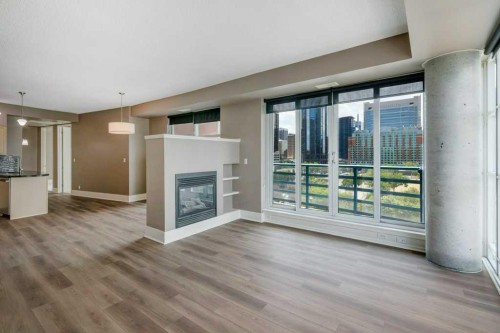701-205 Riverfront Avenue Sw, Calgary, AB - Indoor With Fireplace