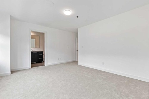 606 Aspen Meadows Hill Sw, Calgary, AB - Indoor Photo Showing Other Room