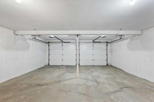 606 Aspen Meadows Hill Sw, Calgary, AB - Indoor Photo Showing Garage