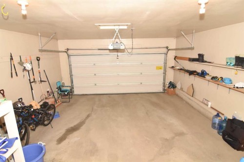 107 Hampshire Close Nw, Calgary, AB - Indoor Photo Showing Garage