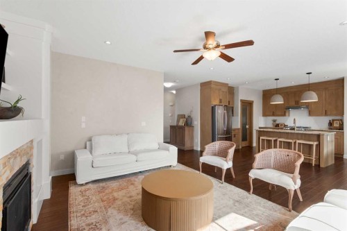 1535 Idaho Street, Carstairs, AB - Indoor Photo Showing Living Room With Fireplace
