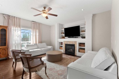 1535 Idaho Street, Carstairs, AB - Indoor Photo Showing Living Room With Fireplace