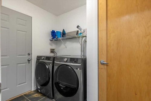 57 Everwillow Boulevard Sw, Calgary, AB - Indoor Photo Showing Laundry Room