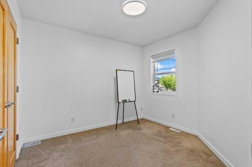 57 Everwillow Boulevard Sw, Calgary, AB - Indoor Photo Showing Other Room
