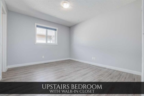 129 Pantego Bay Nw, Calgary, AB - Indoor Photo Showing Other Room