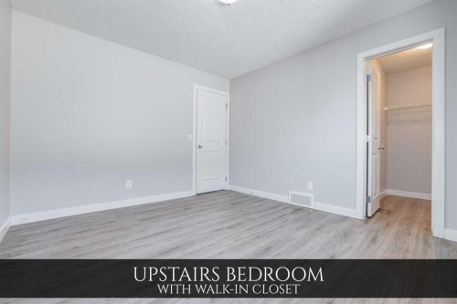 129 Pantego Bay Nw, Calgary, AB - Indoor Photo Showing Other Room