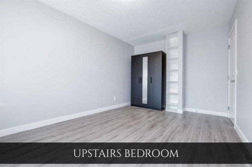 129 Pantego Bay Nw, Calgary, AB - Indoor Photo Showing Other Room