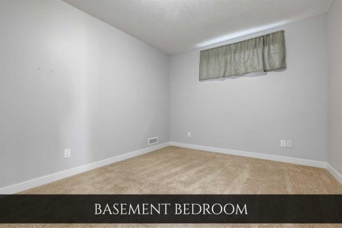 129 Pantego Bay Nw, Calgary, AB - Indoor Photo Showing Other Room