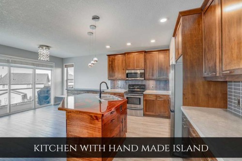 129 Pantego Bay Nw, Calgary, AB - Indoor Photo Showing Kitchen