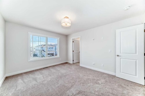 54 Homestead Common Ne, Calgary, AB - Indoor Photo Showing Other Room