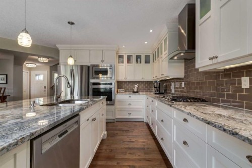 21 Springbank Rise Sw, Calgary, AB - Indoor Photo Showing Kitchen With Upgraded Kitchen