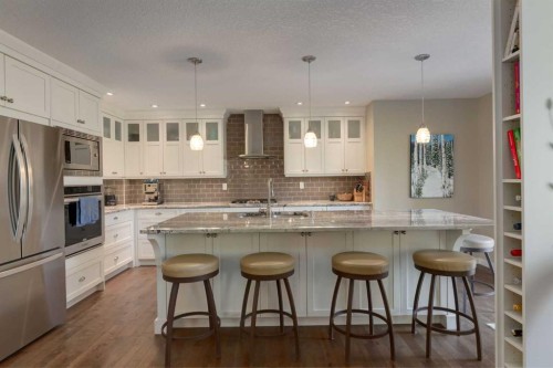 21 Springbank Rise Sw, Calgary, AB - Indoor Photo Showing Kitchen With Stainless Steel Kitchen With Upgraded Kitchen
