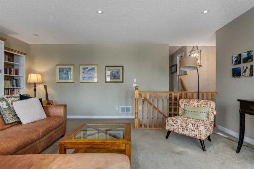 21 Springbank Rise Sw, Calgary, AB - Indoor Photo Showing Living Room