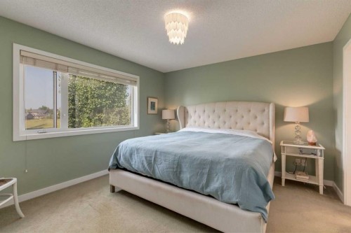 21 Springbank Rise Sw, Calgary, AB - Indoor Photo Showing Bedroom