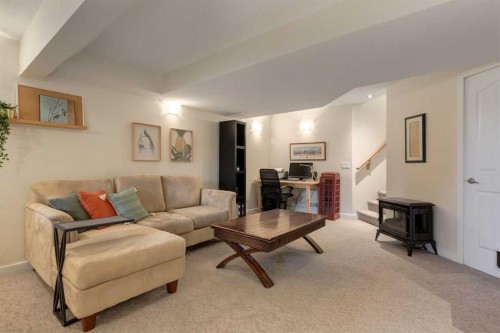 21 Springbank Rise Sw, Calgary, AB - Indoor Photo Showing Living Room