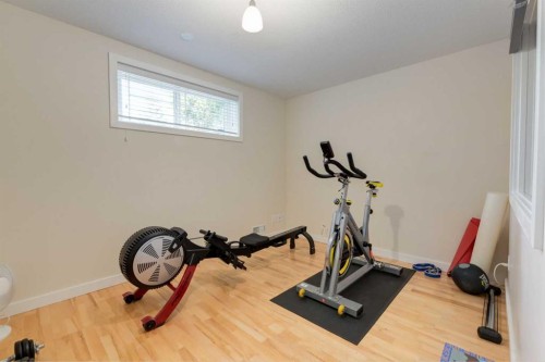 21 Springbank Rise Sw, Calgary, AB - Indoor Photo Showing Gym Room