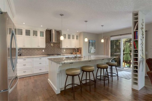 21 Springbank Rise Sw, Calgary, AB - Indoor Photo Showing Kitchen With Upgraded Kitchen