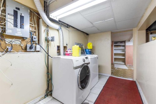 83 Templevale Way Ne, Calgary, AB - Indoor Photo Showing Laundry Room