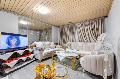 83 Templevale Way Ne, Calgary, AB - Indoor Photo Showing Living Room