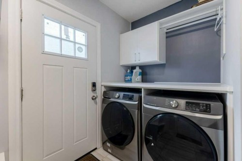 540 Panatella Court Nw, Calgary, AB - Indoor Photo Showing Laundry Room