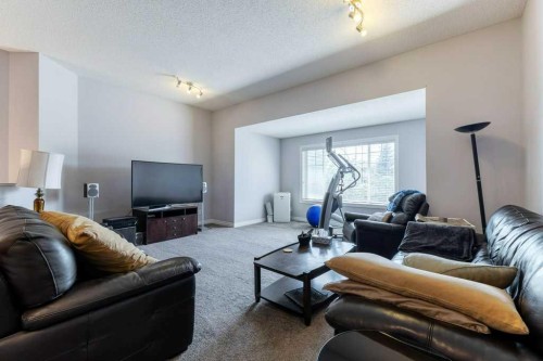 540 Panatella Court Nw, Calgary, AB - Indoor Photo Showing Living Room