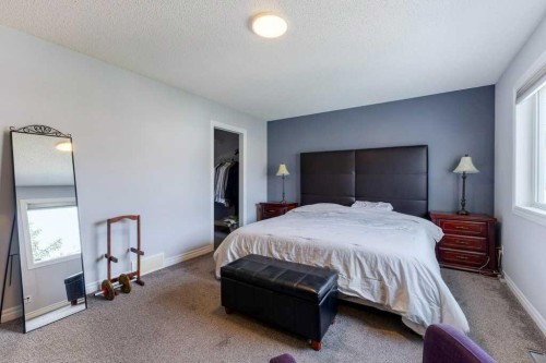 540 Panatella Court Nw, Calgary, AB - Indoor Photo Showing Bedroom