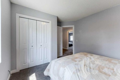 540 Panatella Court Nw, Calgary, AB - Indoor Photo Showing Bedroom