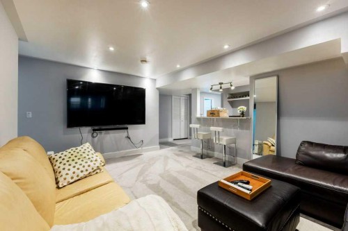 540 Panatella Court Nw, Calgary, AB - Indoor Photo Showing Living Room