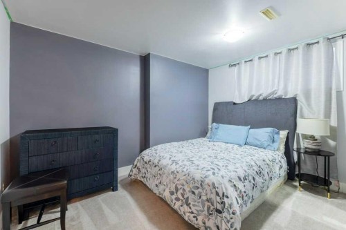 540 Panatella Court Nw, Calgary, AB - Indoor Photo Showing Bedroom