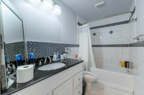 540 Panatella Court Nw, Calgary, AB - Indoor Photo Showing Bathroom
