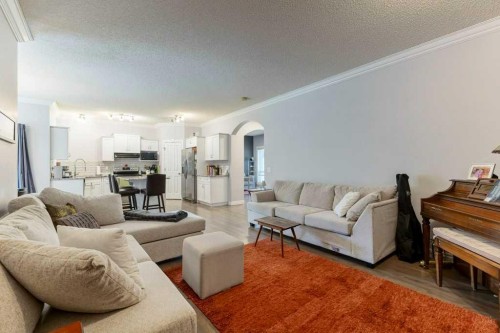 540 Panatella Court Nw, Calgary, AB - Indoor Photo Showing Living Room