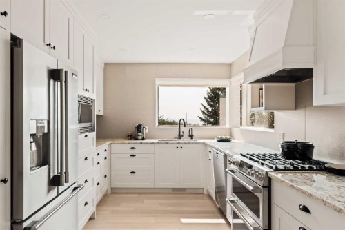 84 Edendale Crescent Nw, Calgary, AB - Indoor Photo Showing Kitchen With Upgraded Kitchen