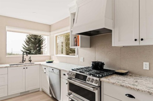 84 Edendale Crescent Nw, Calgary, AB - Indoor Photo Showing Kitchen With Upgraded Kitchen