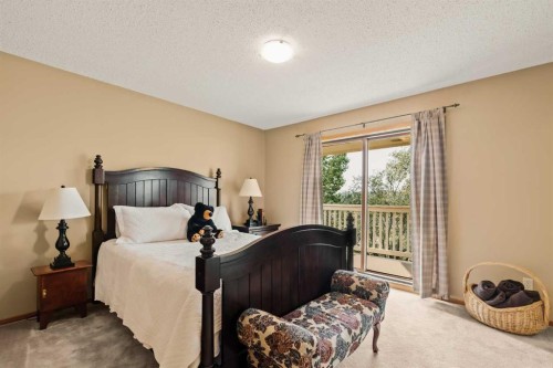 84 Edendale Crescent Nw, Calgary, AB - Indoor Photo Showing Bedroom