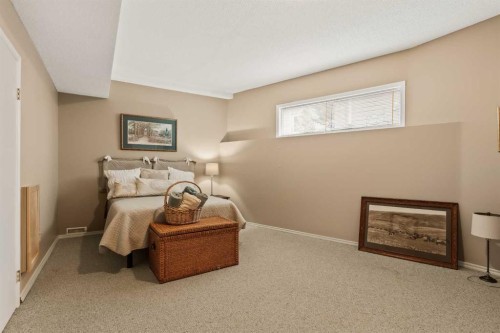 84 Edendale Crescent Nw, Calgary, AB - Indoor Photo Showing Bedroom