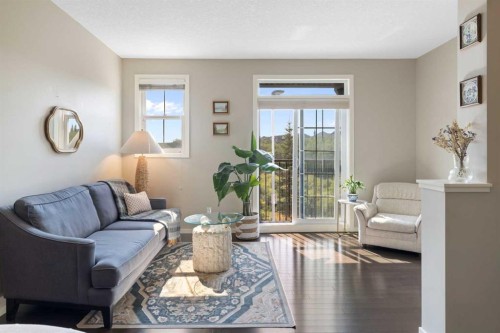 174 Ascot Point Sw, Calgary, AB - Indoor Photo Showing Living Room