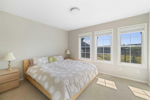 174 Ascot Point Sw, Calgary, AB - Indoor Photo Showing Bedroom