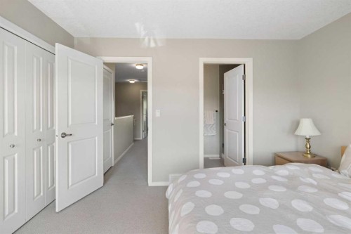 174 Ascot Point Sw, Calgary, AB - Indoor Photo Showing Bedroom