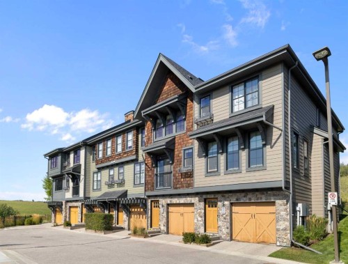 174 Ascot Point Sw, Calgary, AB - Outdoor With Balcony With Facade