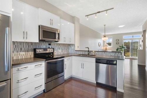 174 Ascot Point Sw, Calgary, AB - Indoor Photo Showing Kitchen With Stainless Steel Kitchen With Upgraded Kitchen