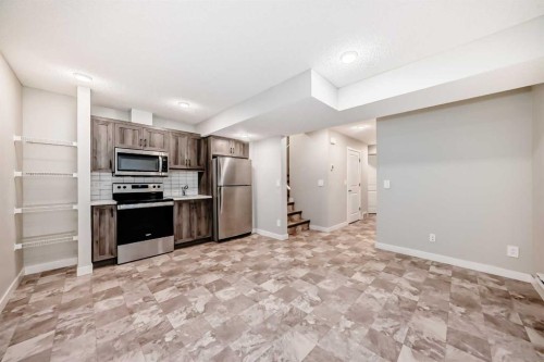 7468 202 Avenue Se, Calgary, AB - Indoor Photo Showing Kitchen With Stainless Steel Kitchen