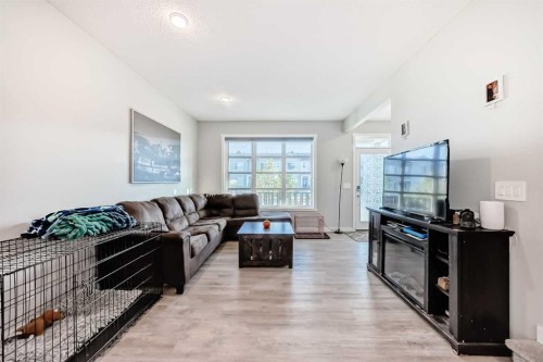 7468 202 Avenue Se, Calgary, AB - Indoor Photo Showing Living Room