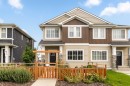 182 River Heights Drive, Cochrane, AB  - Outdoor With Facade 