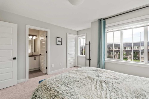 182 River Heights Drive, Cochrane, AB - Indoor Photo Showing Bedroom
