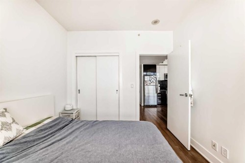 1202-550 Riverfront Avenue Se, Calgary, AB - Indoor Photo Showing Bedroom