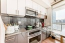 1202-550 Riverfront Avenue Se, Calgary, AB  - Indoor Photo Showing Kitchen With Upgraded Kitchen 